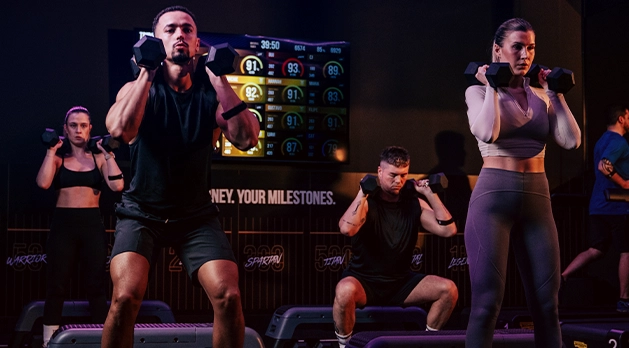 TRIB3 workout attendees focusing on the resistance zone